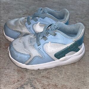 Nike Blue and White Sneakers with Retro Design